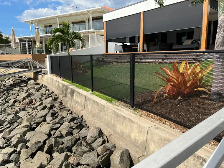 The same canal home, along the top of the rock wall.