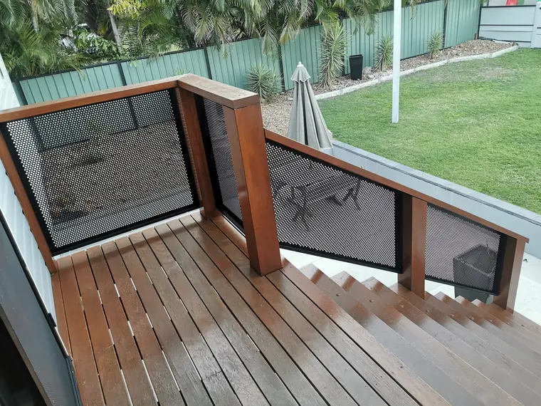 From the deck down the stairs, one balustrade the whole way.