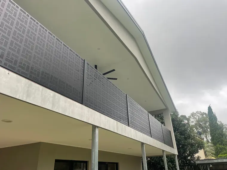 Nahosh panels along a long upstairs balcony.