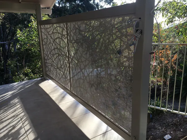 A tall Swirl panel giving a deck some privacy.