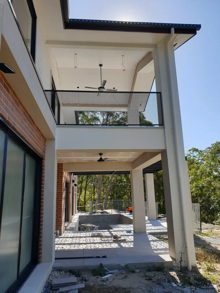 Looking up from the yard. Long panels mean fewer joins along the edge.
