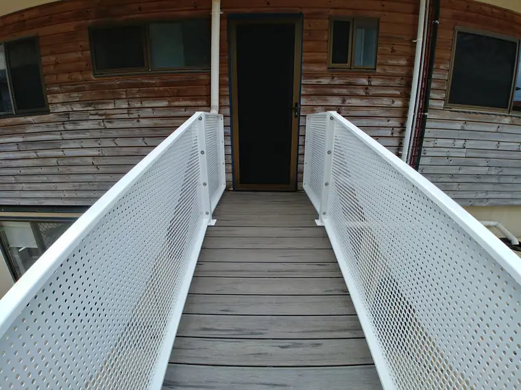 The top of the same stair. Each panel is folded around the corner at the end.
